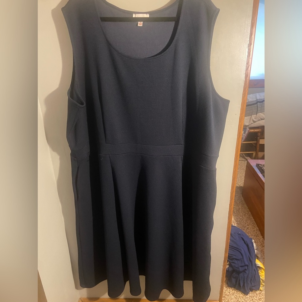 Below the knee dress with pockets.